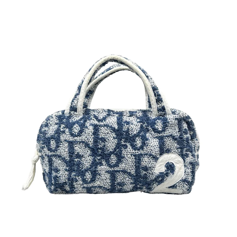 Christian Dior handbags for the modern woman’s wardrobe -DIOR BLUE TROTTER MONOGRAM TOWEL BAG