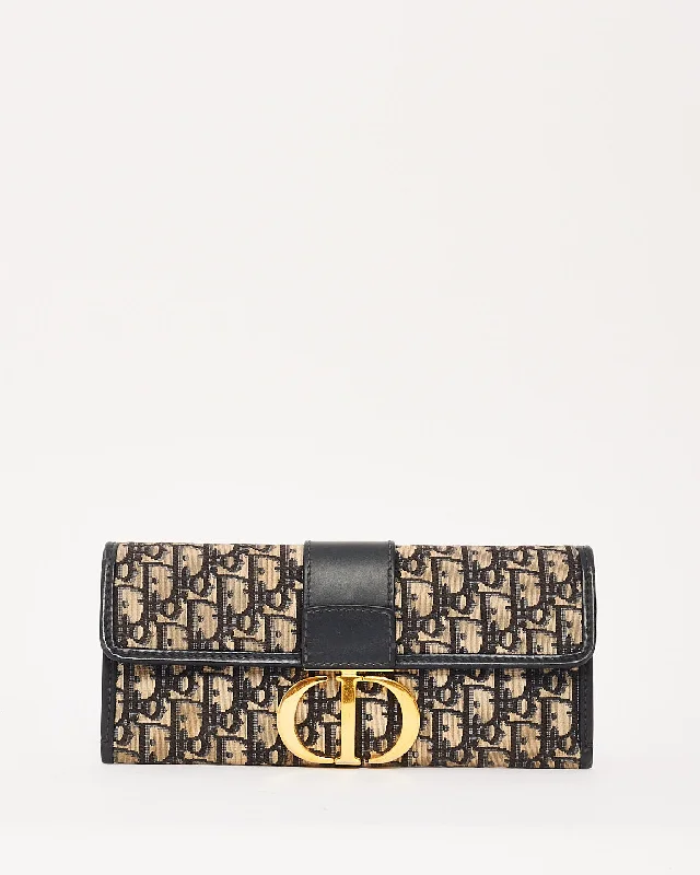 Christian Dior handbags with signature finishes -Dior Navy Oblique Canvas 30Montaigne Chain Clutch Bag