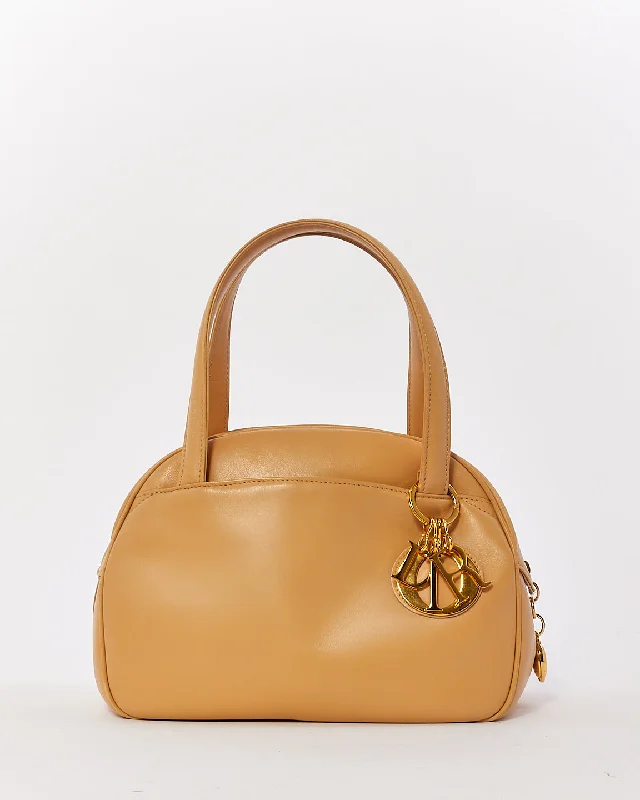 Christian Dior handbags with leather accents -Dior Vintage Beige Leather Top Handle Bag with Dior Charm