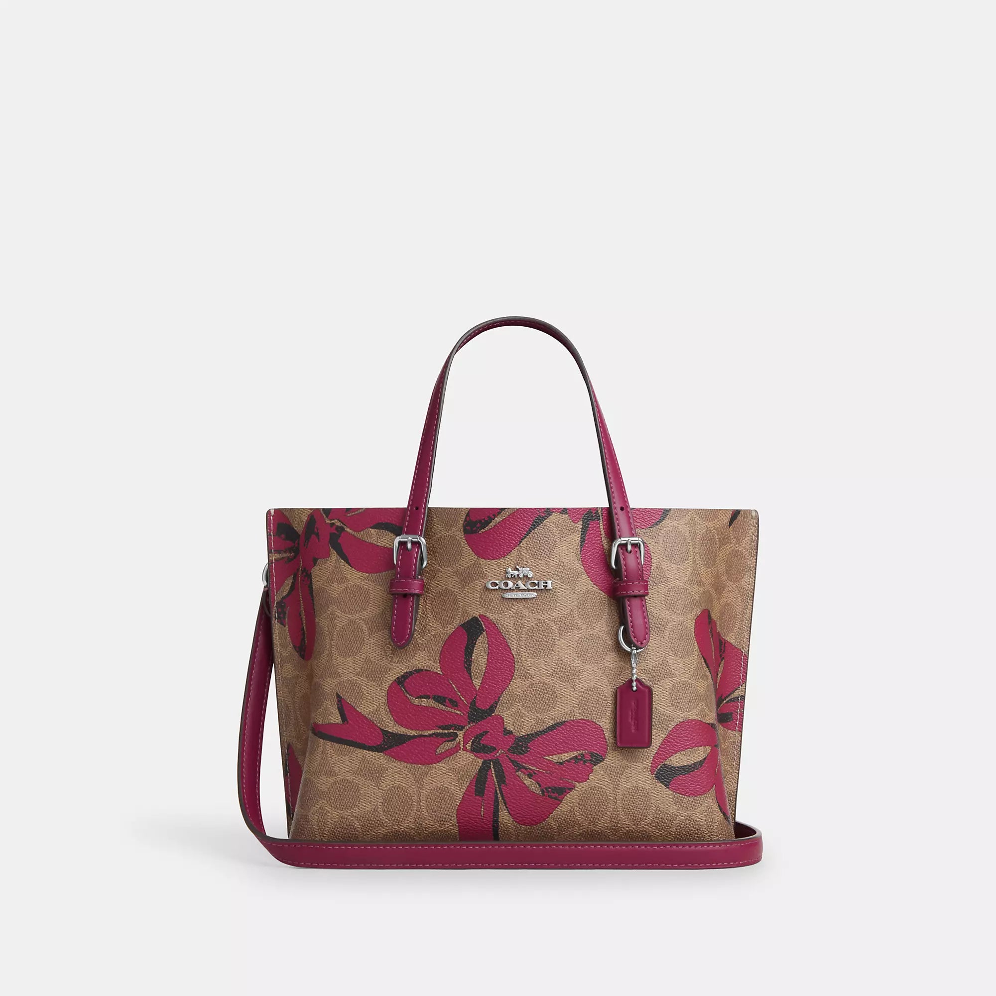 Coach bags with minimalist designs -Coach Outlet Mollie Tote Bag 25 In Signature Canvas With Bow Print