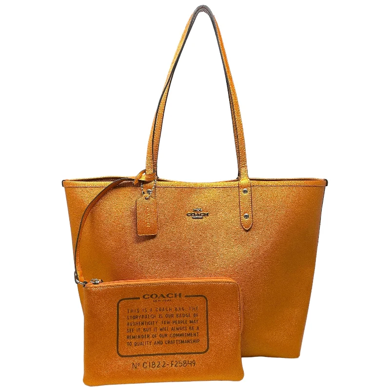 Coach handbags with chic color combinations -Reversible City Tote with Pouch -Signature Canvas Khaki/Metallic Tangerine Designer By Coach  Size: Large