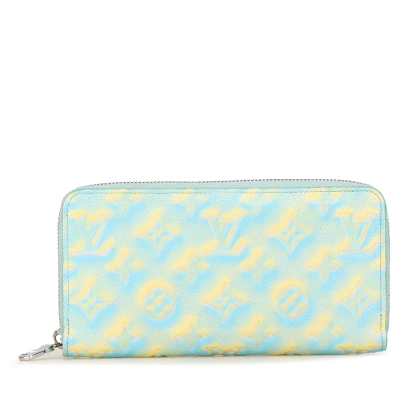 Louis Vuitton bags with embossed leather textures -Louis Vuitton Monogram Empreinte Summer Stardust Zippy Wallet (SHG-5GbMCo)