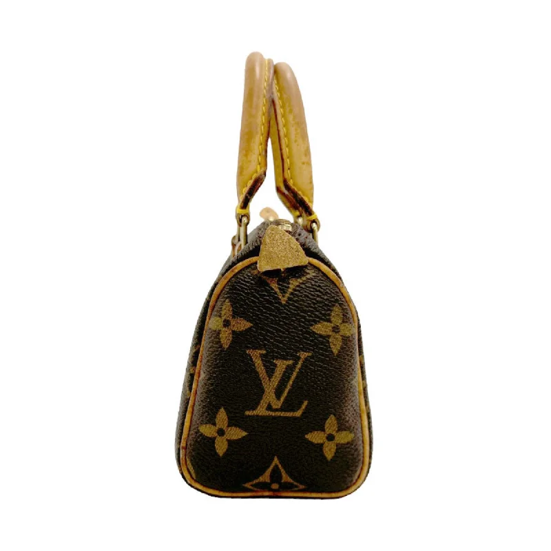 Louis Vuitton bags with stunning metallic accents -LOUIS VUITTON Mini speedy Handbag