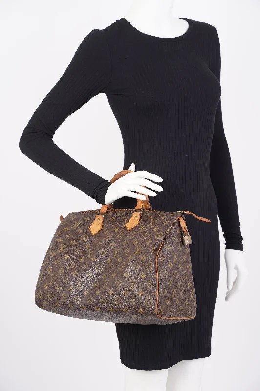 Louis Vuitton bags with sleek hardware -Louis Vuitton  Speedy Monogram Canvas 35